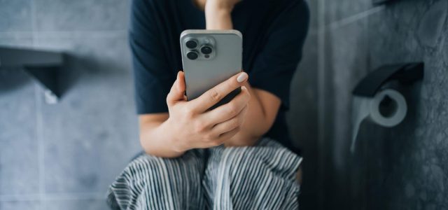 Checking Your Phone in the Bathroom Might Be Doing More Harm Than You Think