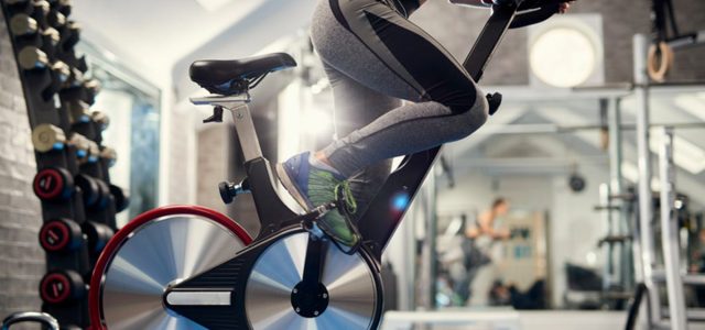 9 Ways You’re Using Your Exercise Bike Wrong, According to Cycling Pros